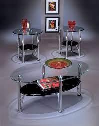 Sporting a dramatic contrast of light and sporting a dramatic contrast of light and dark tones, this table is crafted with acacia wood and veneers beautified with a distressed, glazed finish. Ashley Furniture Dempsey Black 3pc Coffee Table Set 3 Piece Coffee Table Set Coffee Table Coffee Table Setting