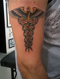 The snake symbolizes, through the shedding of its skin, the renewal of life. 20 Amazing Caduceus Tattoo Designs Petpress