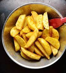 Membuat Camilan Potato Wedges