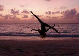 Gymnastics In Sunset Sunset Pictures Beach Landscape Gymnastics Poses