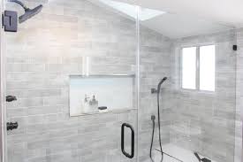 The inset shelf above the tub is really nice. Neutral Rustic Master Bathroom With Gray Tile Backsplash In Glass Shower Hgtv