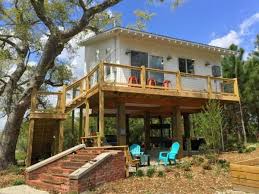 Modern style house plan 2 beds 5 baths 1953 sq ft 890 6 houseplans com. Small Stilt Seashore Home Tiny House Blog