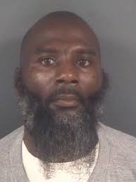 Wanted: Police seek man charged in death of woman at North Carolina motel