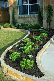 Our Lot Slopes From Front To Back So We Need A Barrier Wall Like This To Keep The Water Away Garden Front Of House Outdoor Garden Decor Front Yard Landscaping