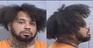 Farmington counselor charged after stolen gun, meth found in office