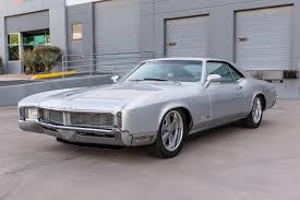 Image result for Riviera Champagne 1966 Buick