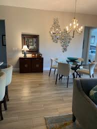 Choosing lights with downward designed globes directs the light to the counter top where you are if you have an eating area in your kitchen, a single pendant light hung over the table will help define the space. Chandelier Over 54 Round Dining Table