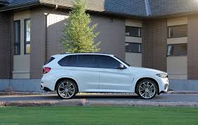 Bmw F15 X5 On Vossen Vfs2 22x10 5 22x12 Gloss Graphite With Pirelli Scorpion Tires Bmw Bmw Classic Cars Bmw X5 M Sport