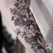 Forearm Bird And Flower Tattoo 60 Snake Tattoo Ideas Cuded Snake Tattoo Snake Tattoo Design Tattoos