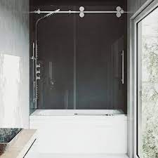 A new shower door can benefit a bathroom enormously by providing a more attractive bathtub area and keeping shower spray out of the rest of the bathroom. Vigo Elan Frameless Adjustable Sliding Tub Door