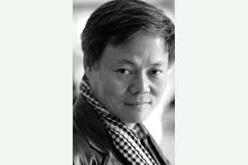 Prominent Vietnamese writer in hiding says police are harassing his family 