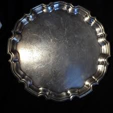 As your guests pick up homemade treats off your newly polished vintage serving tray, you can smile knowing you didn't spend a fortune (and you're not scratching mama's silver either). Silver Plated Cavalier England Serving Tray Vintage Silver Etsy Silver Serving Trays Silver Engraving Vintage Silver