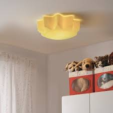 Use florescent or led light fixtures as these produce less heat than incandescent bulbs. Solhem Ceiling Lamp Yellow Sun Ikea