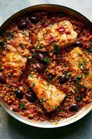 One Pot Smoky Fish With Tomato Olives And Couscous Recipe Recipe Couscous Recipes Nyt Cooking Recipes