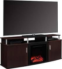 Fireplace media stands resemble traditional media center consoles. 10 Great Tv Consoles With Built In Electric Fireplaces