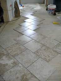 Tile is a great flooring option because of its durability and stylish appearance. How To Lay Tile As Far As I Know Sarah S Big Idea How To Lay Tile Patterned Floor Tiles Flooring