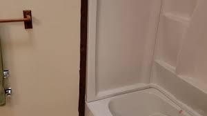 The walls are a little rough but it will have to do. Diy How To Finish A Bathtub Shower Surround Youtube