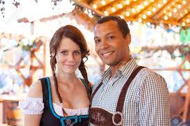 Interracial Couple Having A Date At Oktoberfest In Munich Stock Photo,  Picture and Royalty Free Image. Image 66358865.