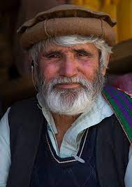 Afghanistan men clothing is mix of all different types of colors and designs including afghan traditional men's clothing and western styles. Portrait Of An Afghan Man With A White Beard Badakhshan Province Ishkashim Afghanistan Film Photography 35mm Afghanistan India Photography
