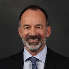 Proud of my son Damien who is a volunteer firefighter and who is pictured  in front putting out this fire keeping our neighborhood safe.