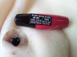 She's really not into these colors. Review Tony Moly Delight Tony Tint In 02 Red Blame The Store