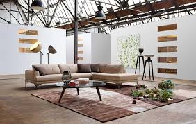 On the other side of the room, a sofa and chairs form a conversational cluster around the fireplace. Contemporary Living Room Ideas With Sofas Founterior
