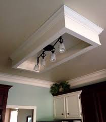 I am considering removing the fluorescent question: Easy Update For Dated Fluorescent Light Box Lighting Makeover Fluorescent Kitchen Lights Kitchen Ceiling Lights
