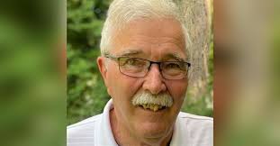 John E. Hartman Obituary