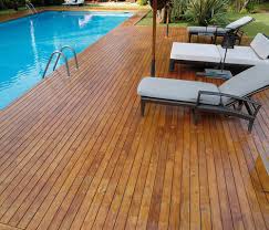 Pool deck designs and construction information including deck orientation, layout, coping, surface materials, building tips, and types of decorative concrete pool deck material options learn what materials are best for pool decks and compare concrete, stone, brick, tile, wood and other options. Swimming Pool Decks Tallahassee Deck Builders