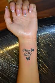 Love for mom and dad is always infinite and they deserve everything special in their lives. Inscription On Wrist Tattoo Pattern Writing Pictures Westend Tattoo Piercing Amp Tattoos For Dad Memorial Tattoos For Daughters Mom Tattoo Designs
