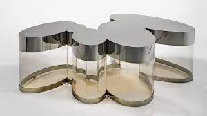 This elegant design makes a statement in any home or office and its regal styling will never go out. Guy De Rougemont Nuage Illuminated Coffee Table Important Design 20th Century Design Sotheby S
