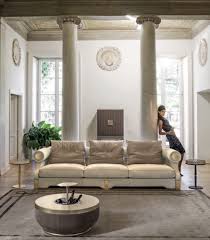 Measuring 48 wide, the coffee table offers plenty of space for decorative vases and a delicious tray of snacks and drinks. Godwin Coffee Table Bar