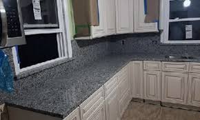 This colonial features a completely remodeled kitchen which includes gorgeous quartz countertops, tile backsplash, and stainless steel appliances. Countertop Materials Granite City Il Kitchen Countertops