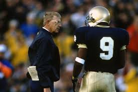 He is an american football coach who is currently in the head coach and executive vice president position of the seattle seahawks team. Top Ten Greatest Notre Dame Football Coaches 4 Lou Holtz One Foot Down