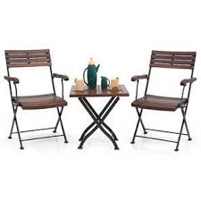 Giantex 3 pcs folding bistro set outdoor patio rocking chairs round table set 2 rocking chairs w/glass coffee table for yard, patio, deck, backyard padded seat (blue & gray) 4.7 out of 5 stars. Masai Arm Chair Table Set Teak Finish Urban Ladder
