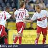 Denmark jon dahl tomasson (c) is followed by his team mate christian poulsen as they celebrate thomasson's second goal against sweden during their euro 2004 group c soccer match at bessa stadium in porto june 22, 2004. Https Encrypted Tbn0 Gstatic Com Images Q Tbn And9gct3gfz9duxzxvnjtaadvgdhxx5yjcga0caosymvslhkkkapon1r Usqp Cau