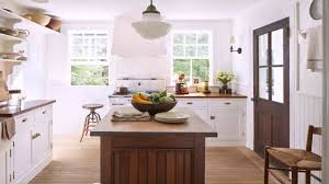 white kitchen cabinets dark wood floors