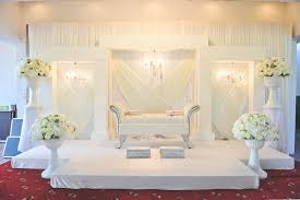 A wedding carriage, ceremonial tent and wedding aisle floral decoration. Elegant White Malay Wedding By Andrew Yep Photographie Wedding Stage Decorations Malay Wedding Wedding Stage
