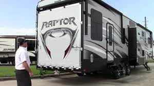 The raptor toy hauler defines elegance. New 2015 Keystone Raptor 412ts Fifth Wheel Toy Hauler Rv Holiday World Of Houston Dallas Youtube