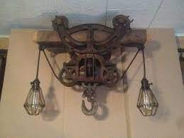 Antique Hay Trolley Hanging Cage Lighting Made From An Antique 1909 Beatty Bros Limited Wood Be Pulley Light Fixture Repurpose Light Fixture Vintage Lighting