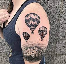 Hot air balloon floating along looking for a place to land her heart. Top 30 Hot Air Balloon Tattoos Stunning Hot Air Balloon Tattoo Designs