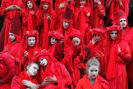 From our coverage of extinction rebellion activity around the world to commentary on climate change news and events, the extinction rebellion blog. The Meaning Behind Extinction Rebellion S Red Robed Protesters Dazed