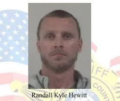 Man deemed danger to public arrested, found with several firearms