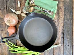 Special coil on handle designed for easy lifting. Cast Iron Seasoning Dutch Oven Daddy