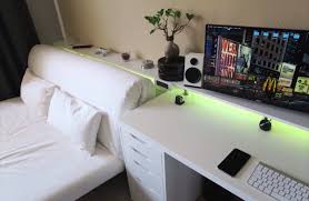 This game room setup includes a large wall mounted tv, an entertainment console for your equipment, speakers and some minimal and comfortable furniture. Simple Gamer Bedroom Novocom Top