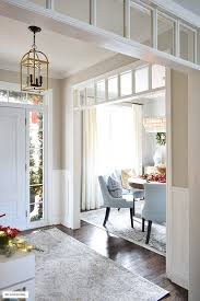 This cape cod inspired custom home includes 5,500 square feet of large open living. Entryway Dining Room Christmas Decorating Citrineliving