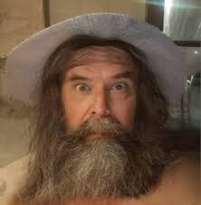 Need again some hints where to look, would go for a helmet shrike but the  orange eye ring confuses me....?