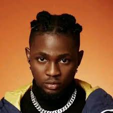 She tell me this She tell me that She said am ———? Boy alon fans I know you  can do better than me