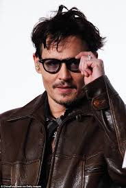 The engagement ring Johnny Depp gave Amber Heard was 'too big for her so he  started wearing it' himself