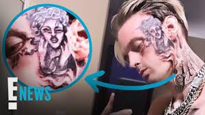 Make carter male name tattoo. Why Did Aaron Carter Get A Rihanna Tattoo On His Face
